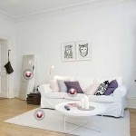 Белый цвет стен в интерьере гостиной