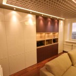 Зона хранения (встроенный шкаф) во всю стену в гостиной