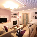 Бежевый диван в центре гостиной. Фото