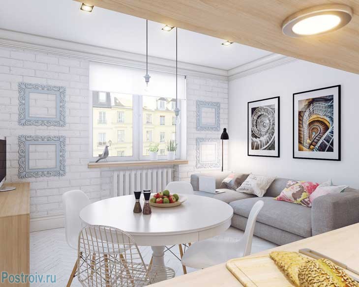 Белая кухня-гостиная в скандинавском стиле. Фото