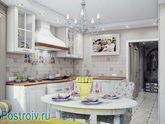 Угловая кухня светлая в двухкомнатной квартире. Овальный обеденный стол Угловая кухня светлая в двухкомнатной квартире. Овальный обеденный стол