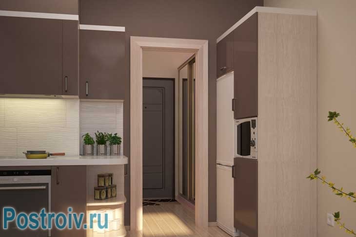 Зона кухни в квартире студии визуально зонирована с помощью декоративных колон - Фото Зона кухни в квартире студии визуально зонирована с помощью декоративных колон - Фото