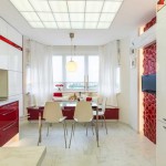 Кухня белого цвета с красным декором. Фото