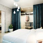 Интерьер белой спальни. Белый кирпич на стенах. Фото