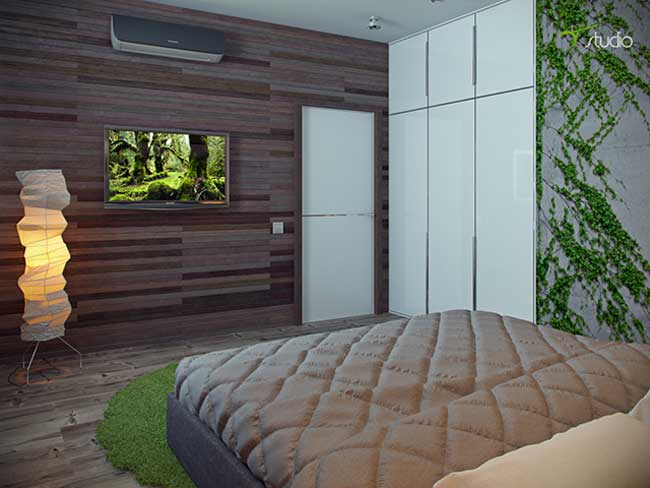 Интерьер спальни в экостиле. Стены отделаны деревянными панелями со встроенным шкафом