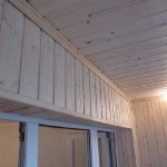 Отделка балкона деревянной вагонкой. Фото