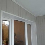 Отделка балкона пластиковой вагонкой. Фото